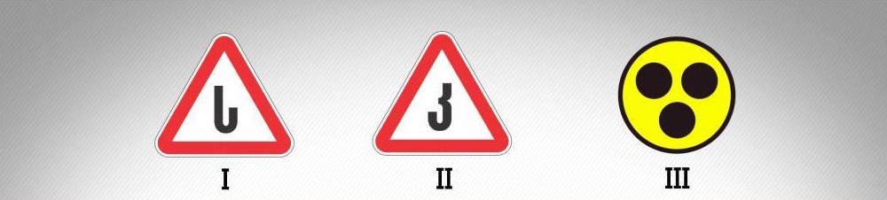 Какой опознавательный знак прикрепляется на задней части того механического транспортного средства, на котором установлены шины с шипами?