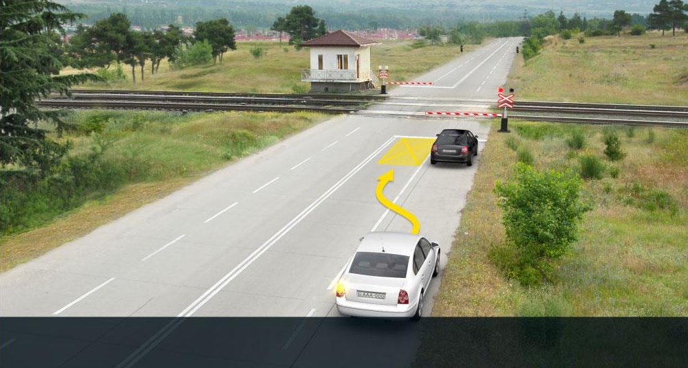 In the present situation, is white car driver prohibited from proceeding the arrow direction?
